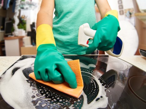 Preparing cleaning supplies for sofa care